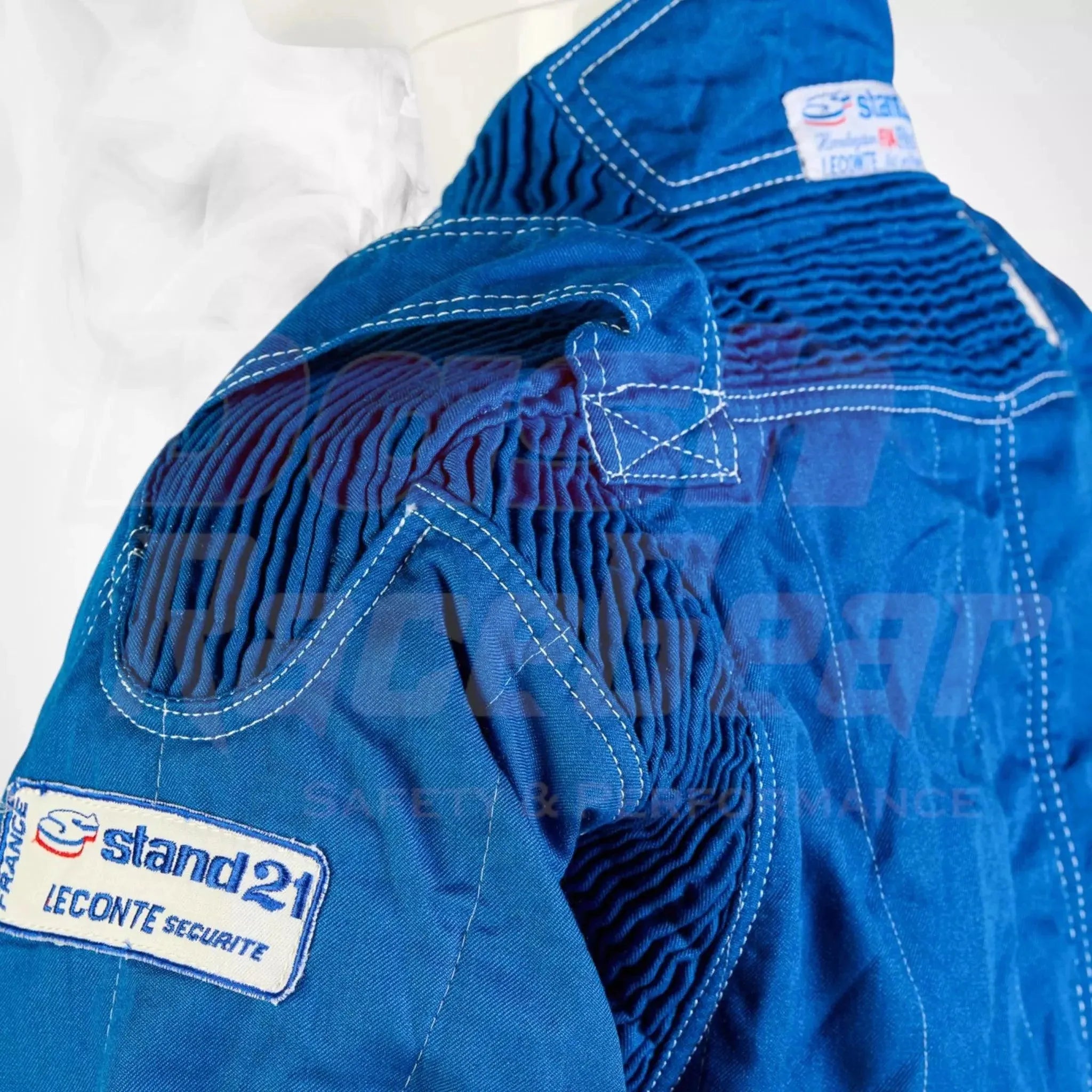 Stand 21 LeConte Blue NIGEL MANSELL’S Race Suit - Dash Racewear