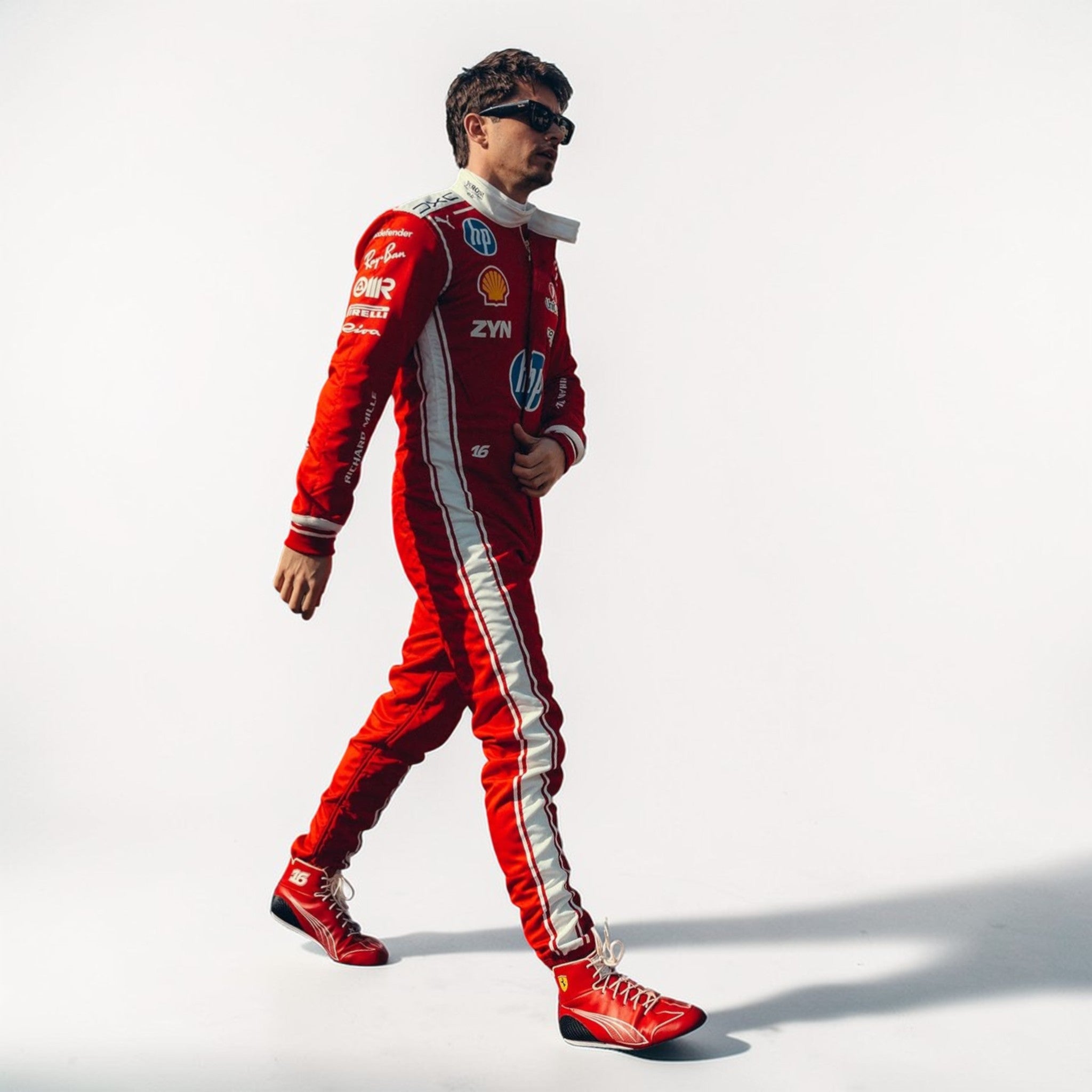 Charles Leclerc 2026 Scuderia Ferrari racing suit walking pose